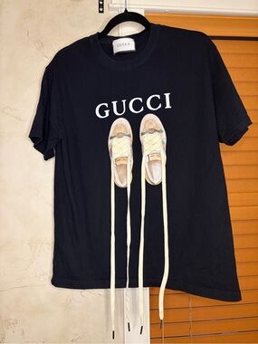 Gucci Black T‑Shirt with White Logo and Sneaker Graphic